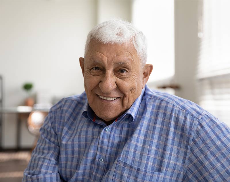 Older Man Sitting on a Couch